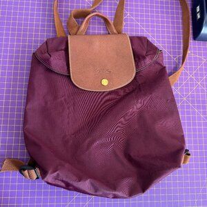 Longchamp le pliage backpack in color plum